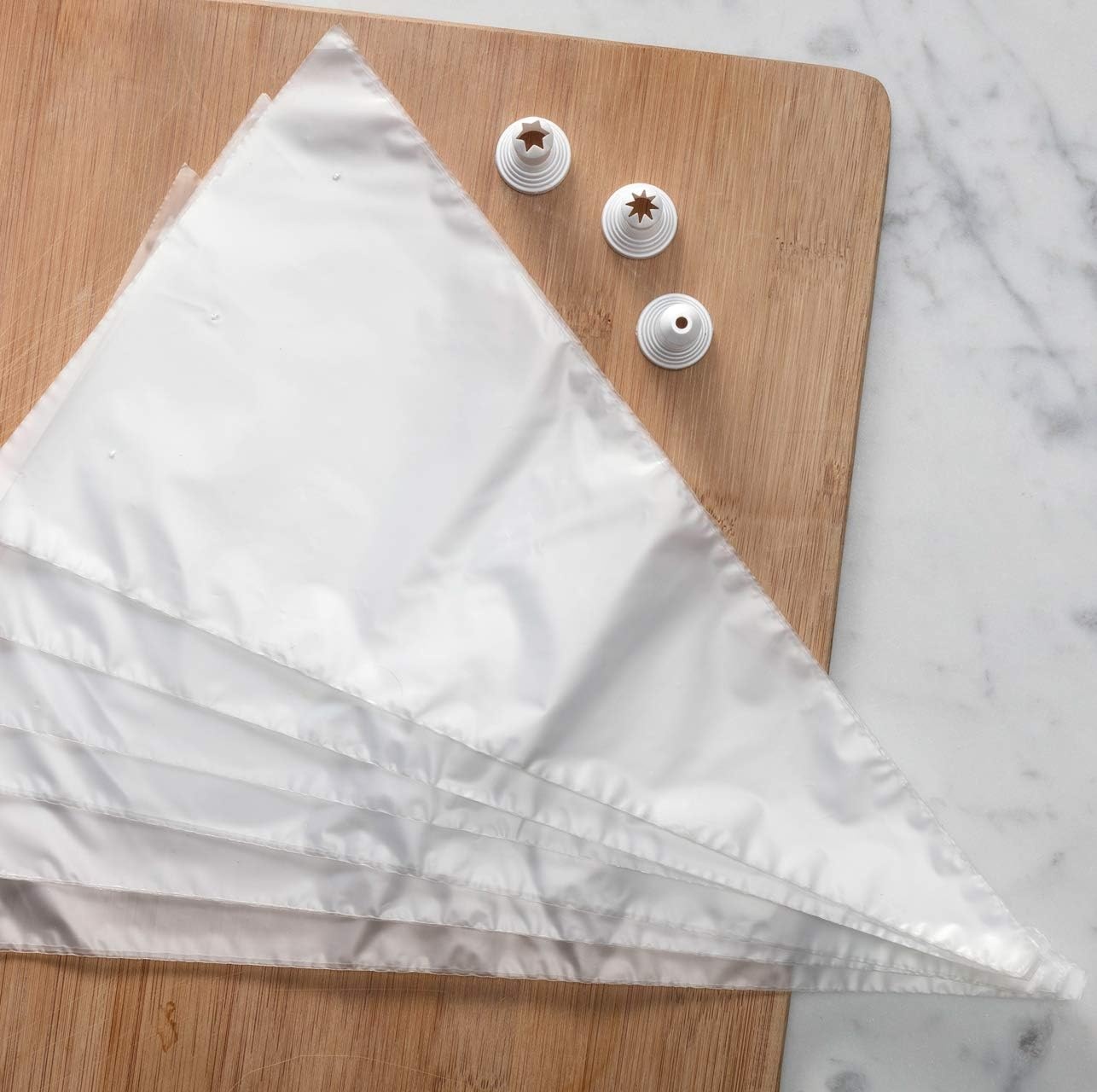 image:imageHutzler Disposable Decorating Bags and 3 Decorating Nozzles SetDecorating Bags with Nozzles